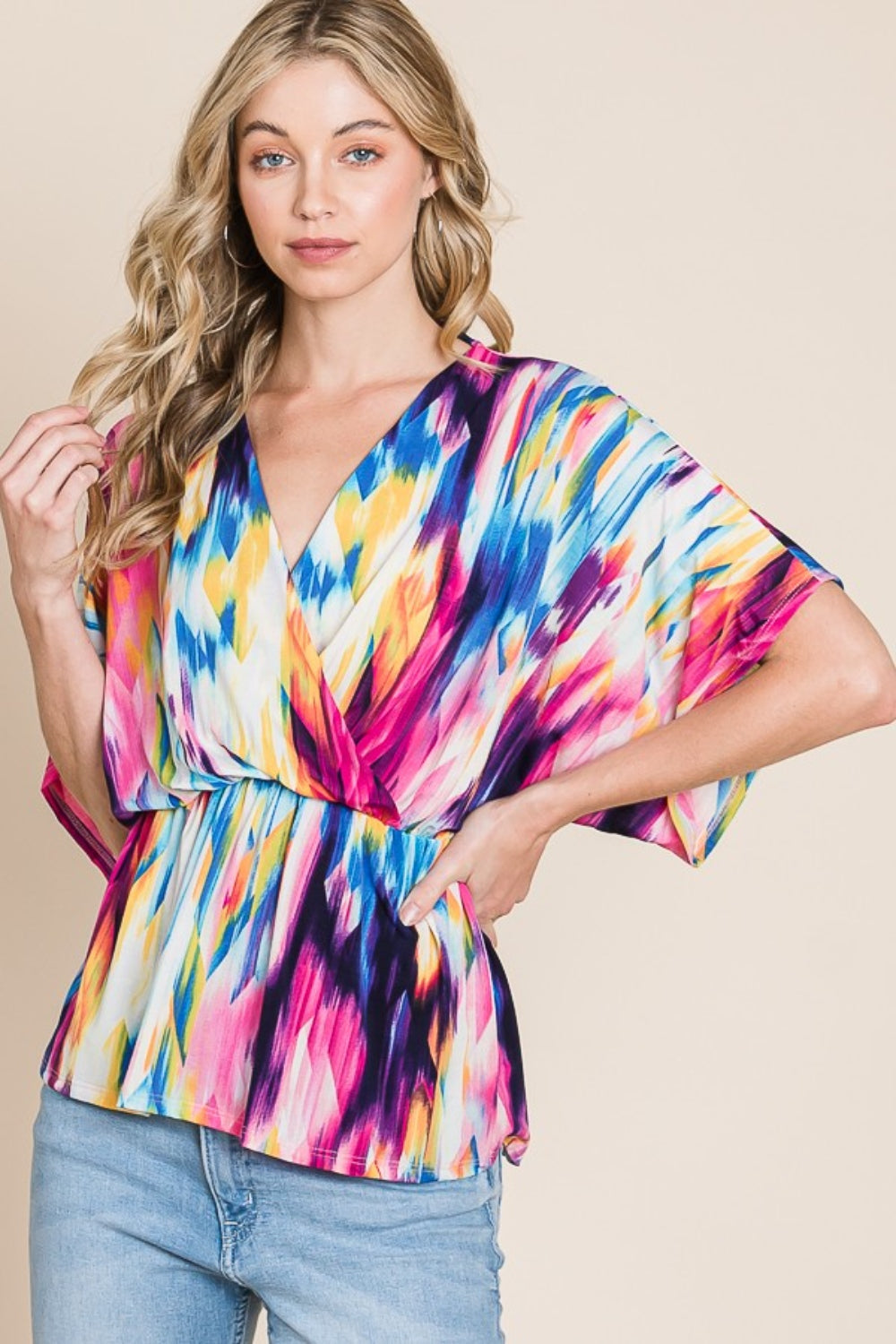 Printed Surplice Peplum Blouse