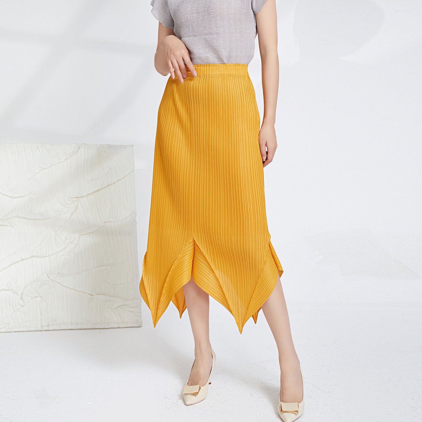 Miyake Pleated Irregular Hem Skirt