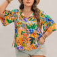 Plus Size Printed Tie Neck Half Sleeve Blouse