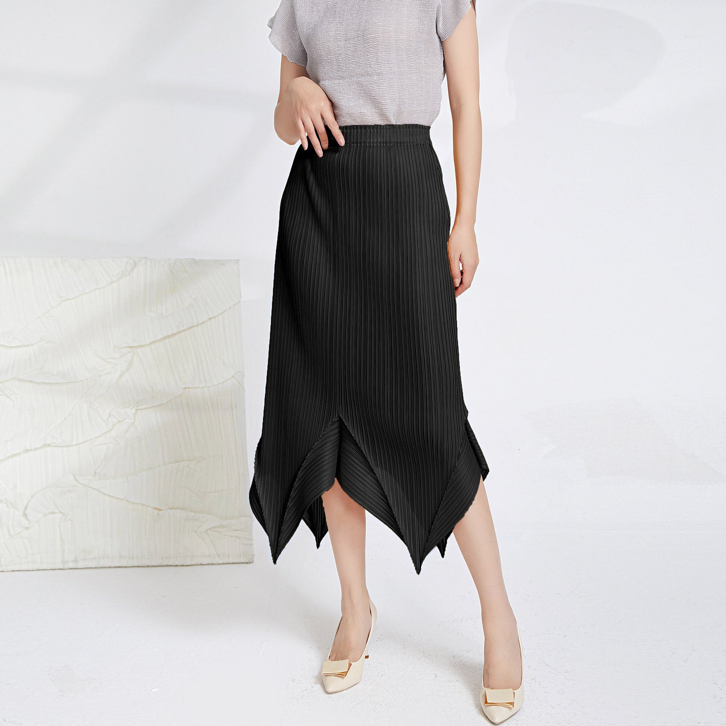 Miyake Pleated Irregular Hem Skirt