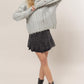 Distressed Cable-Knit Round Neck Long Sleeve Sweater