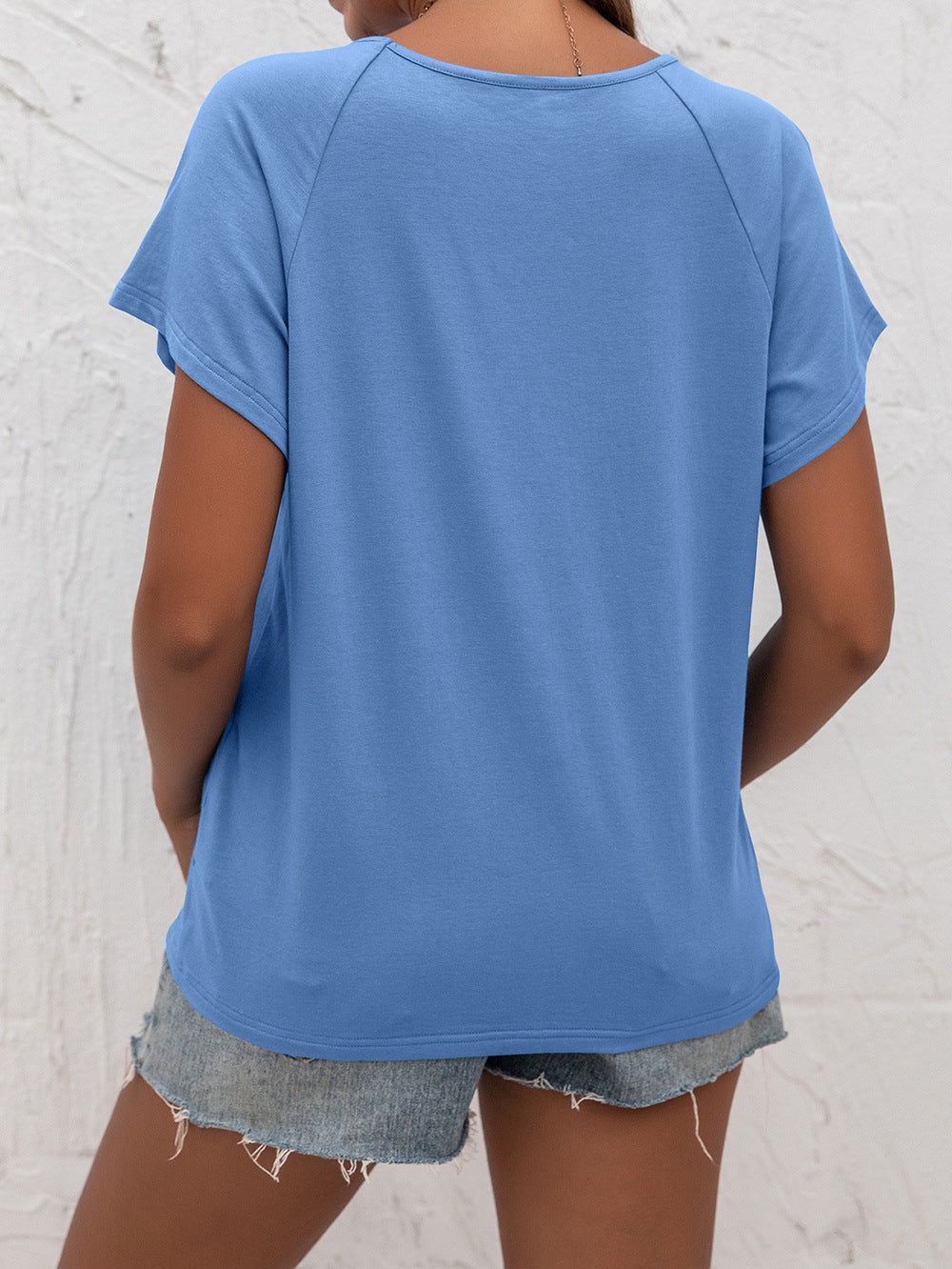 Woman in Blue Cutout Round Neck T-Shirt